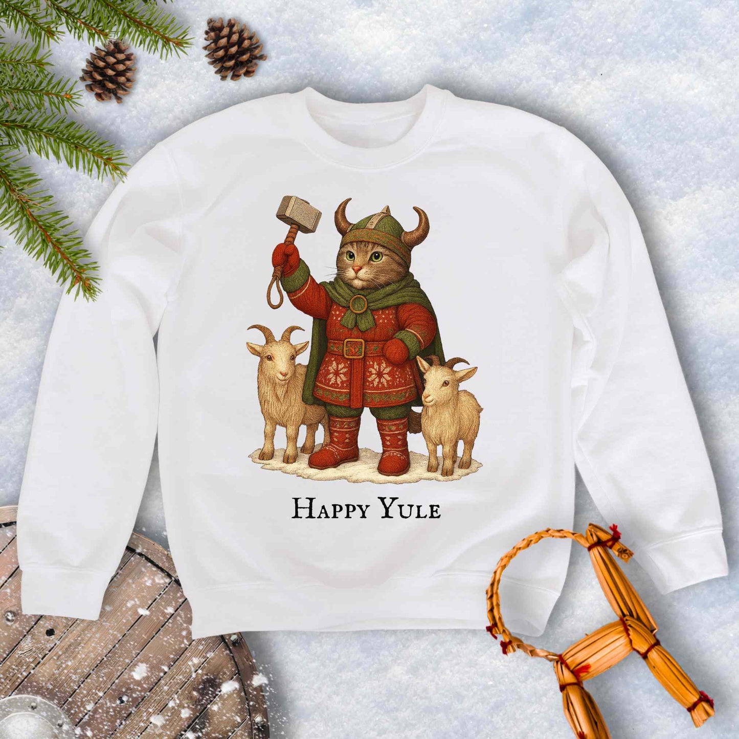 White sweatshirt with a aesir Thor reimagined Viking cat design and two goats. 'Happy Yule' text on a snowy background.