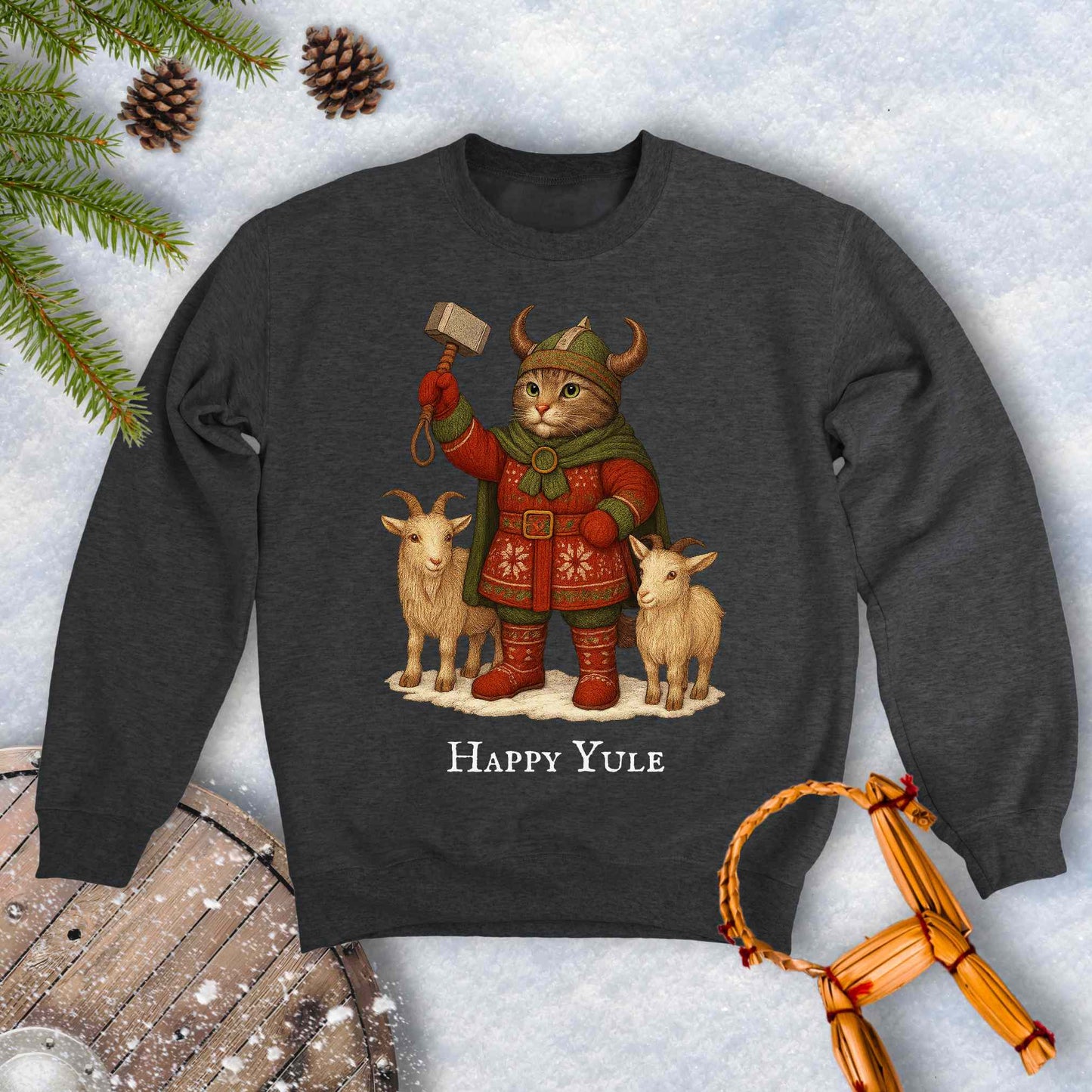 Dark gray sweatshirt with a aesir Thor reimagined Viking cat design and two goats. 'Happy Yule' text on a snowy background.