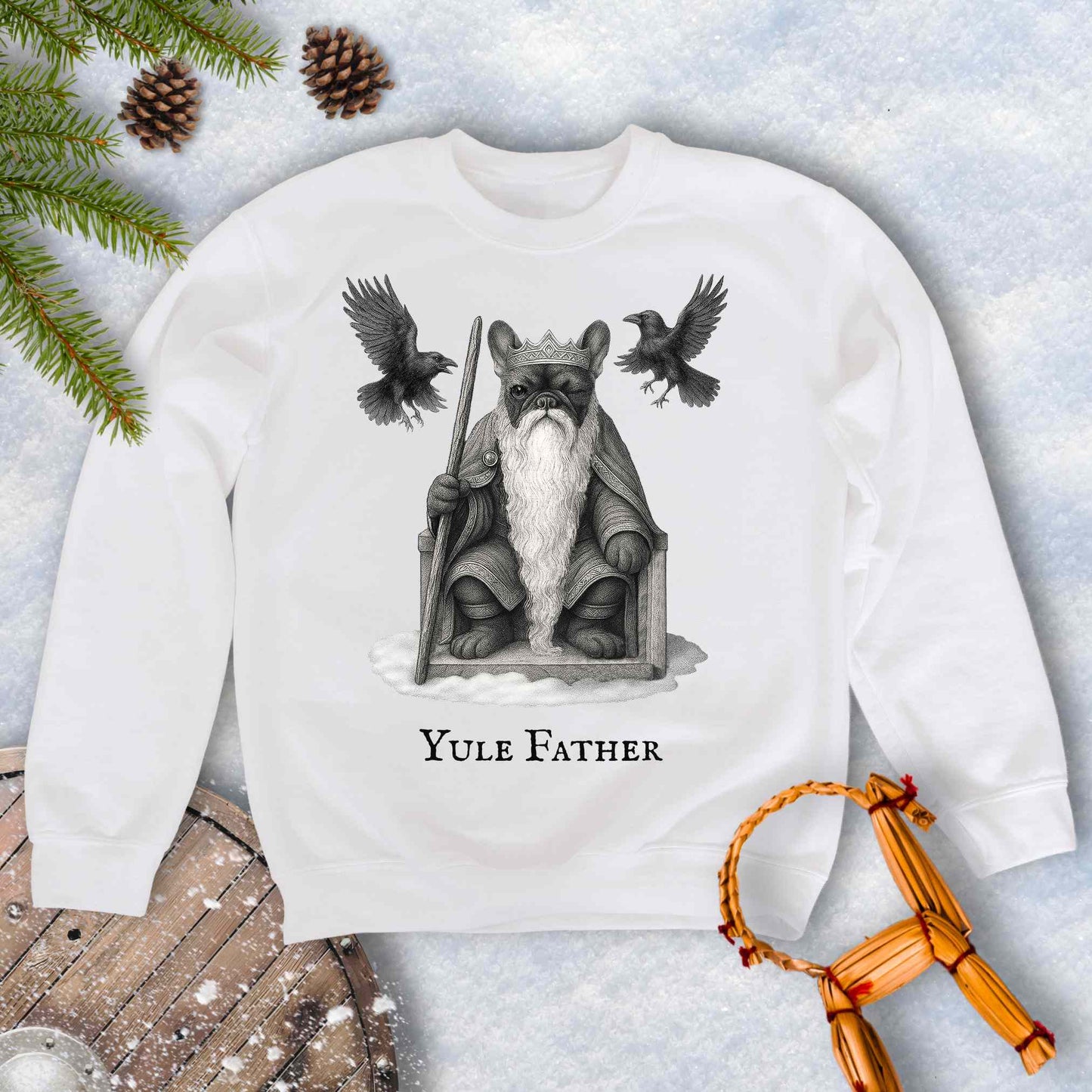 White sweatshirt with 'Yule Father' design, Aesir Odin as a French Bulldog and ravens Huginn and Muninn, on a snowy background