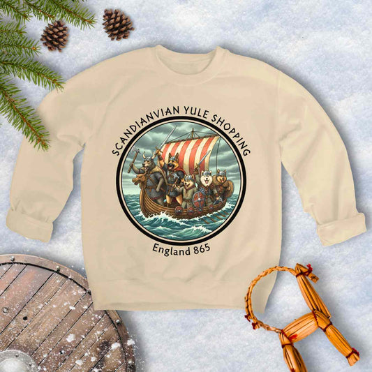 Beige sweatshirt with Viking Dogs on a Viking ship. Text: Scandinavian Yule Shopping England 865.