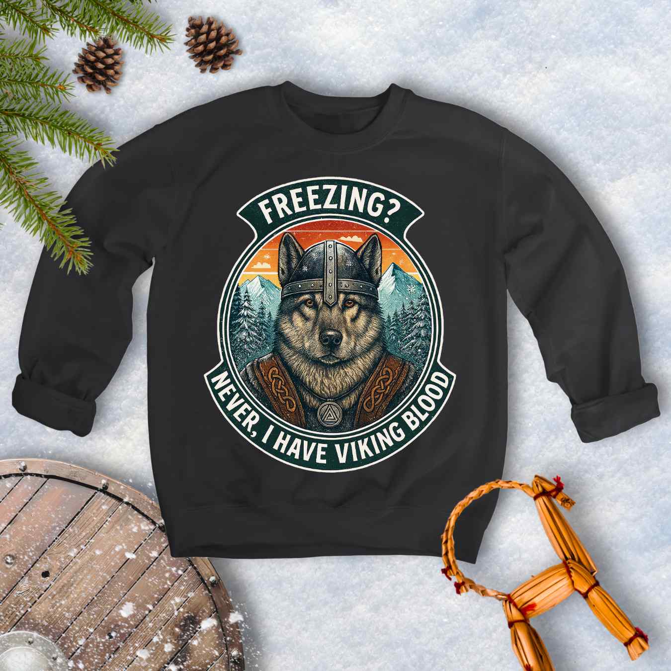 Black sweatshirt with a graphic of a Viking Norwegian Elkhound and text 'Freezing? Never, I have Viking blood' with a Nordic, retro sunset graphic in the background.