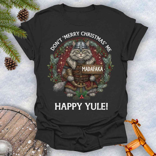 Black t-shirt with a Viking cat Christmas graphic and Christmas-themed text Don't Merry Christmas Me Madafaka, Happy Yule.