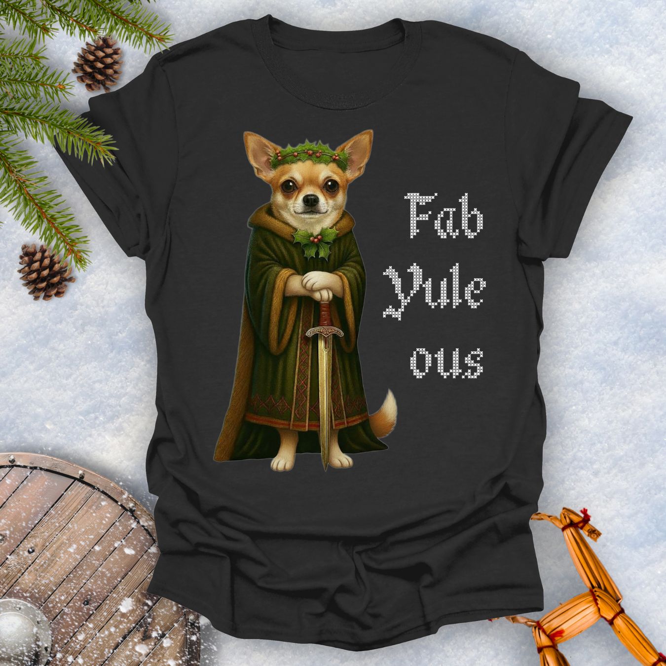 Black t-shirt with a Viking Chihuahua dog in a robe and sword graphic and 'Fab Yule ous' text, surrounded by Christmas decorations.