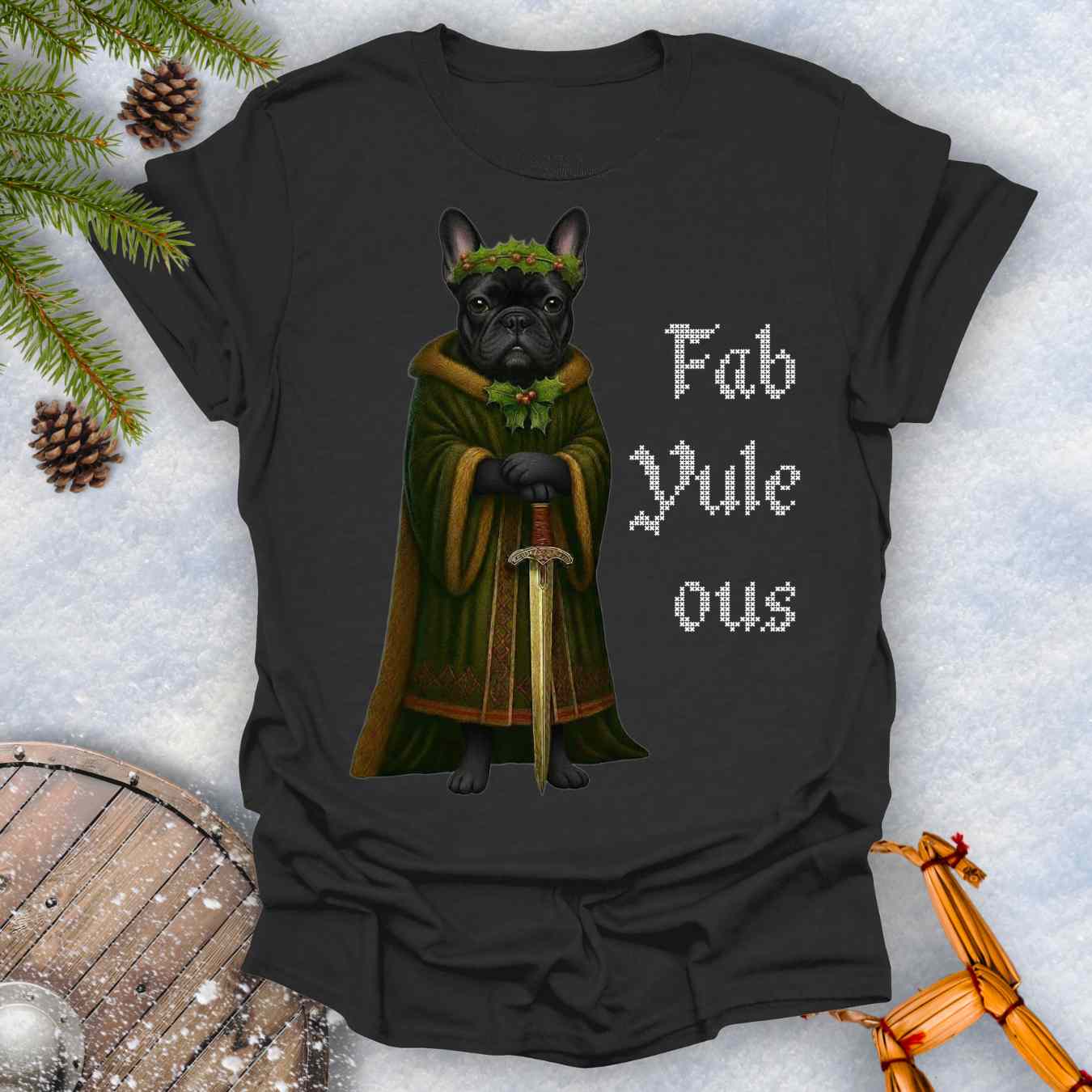 Black t-shirt with a black shieldmaiden Bulldog in a green robe and sword, surrounded by Christmas decorations and vertical text 'Fab Yule ous'.