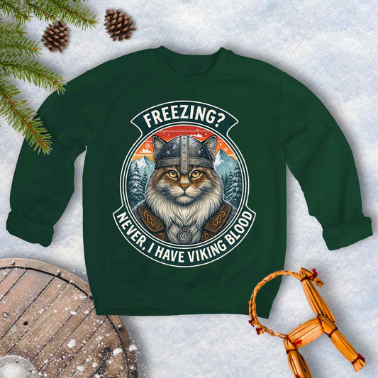 Forest Green sweatshirt with a graphic of a Viking Norwegian Forest Cat and text 'Freezing? Never, I have Viking blood' with a Nordic, retro sunset graphic in the background.