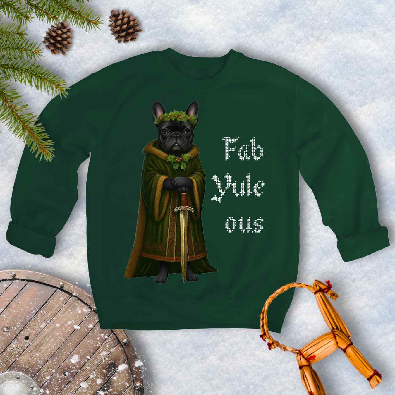 Forest Green sweatshirt with a black shieldmaiden Bulldog in a green robe and sword, surrounded by Christmas decorations and vertical text 'Fab Yule ous'.