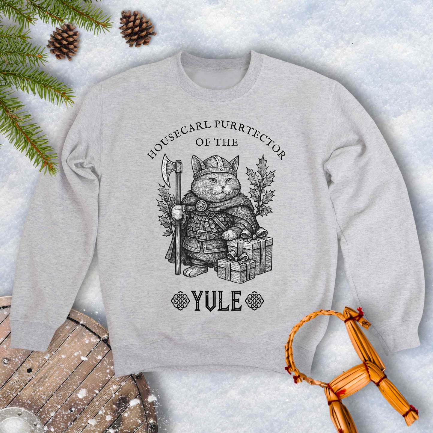 Gray sweatshirt with a cat in a Viking outfit and Christmas gifts with 'Housecat Purrtector of the Yule' text.
