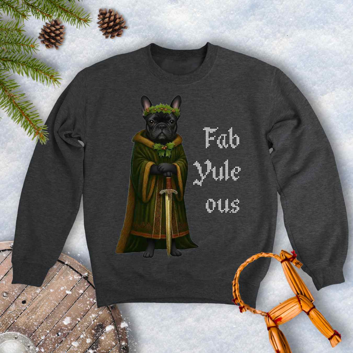 Gray dark heather sweatshirt with a black shieldmaiden Bulldog in a green robe and sword, surrounded by Christmas decorations and vertical text 'Fab Yule ous'.