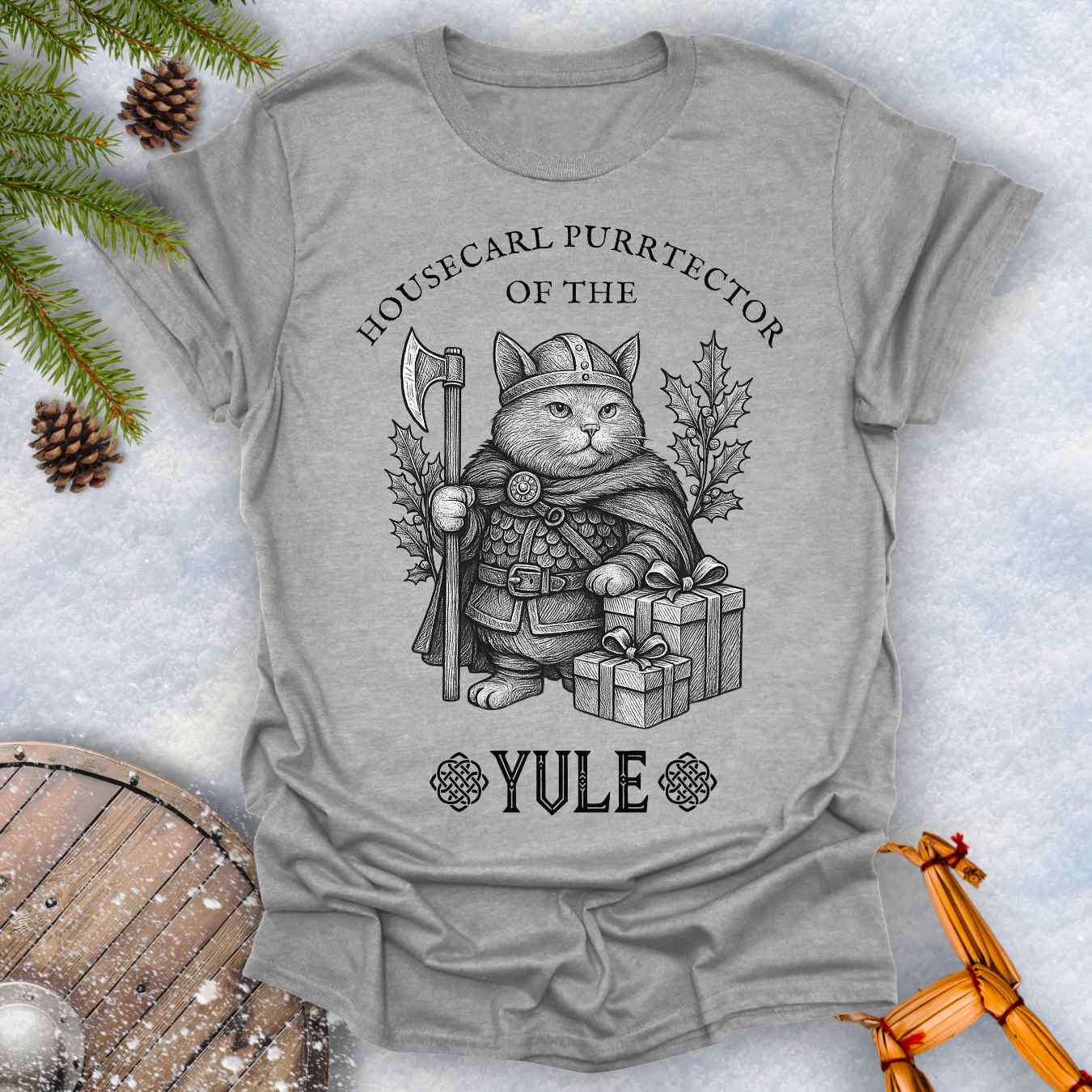 Gray t-shirt with a cat in a Viking outfit and Christmas gifts with 'Housecat Purrtecher of the Yule' text.