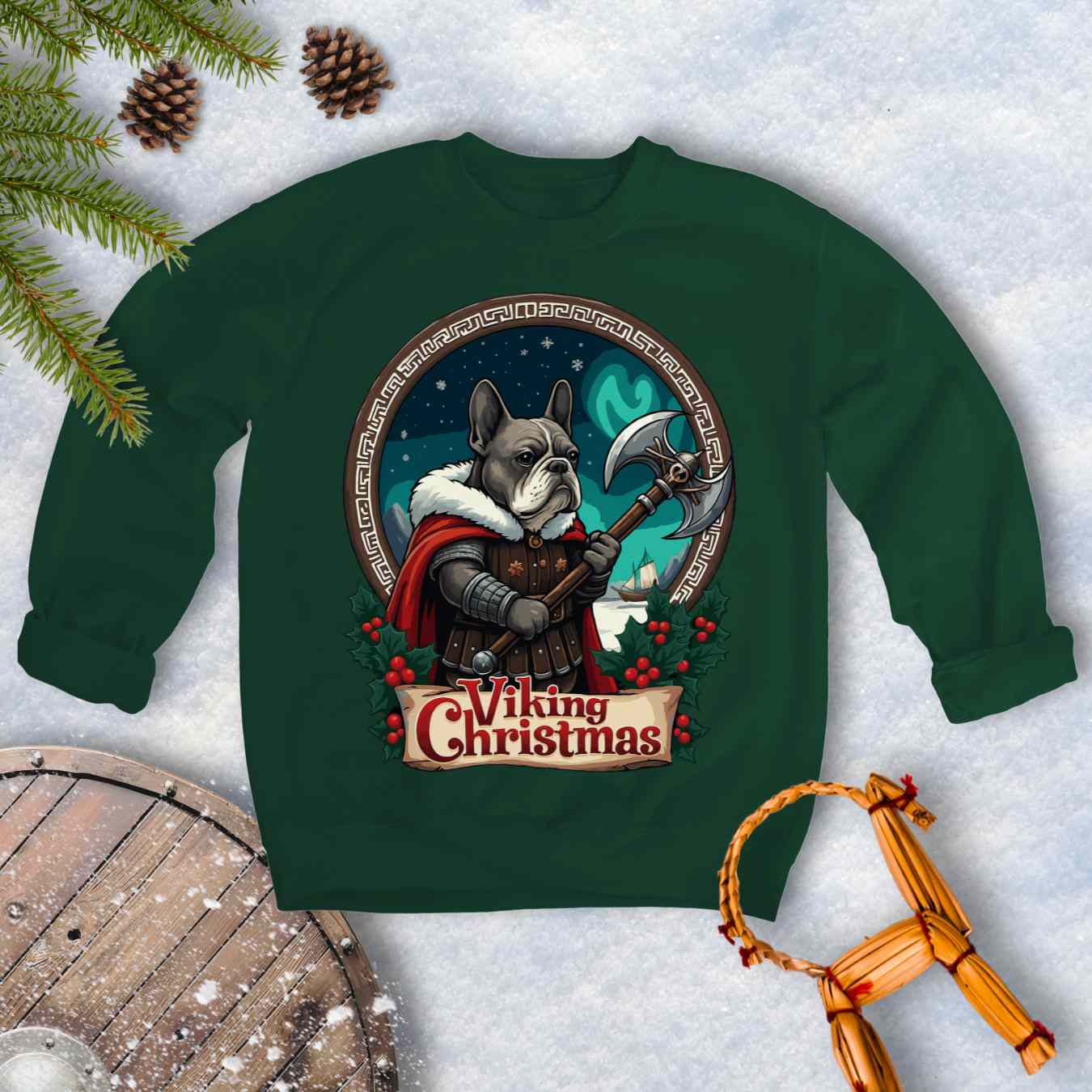 Green sweatshirt with a Viking-themed Christmas design featuring a Viking Bulldog, axe, and northern lights. Text: Viking Christmas.