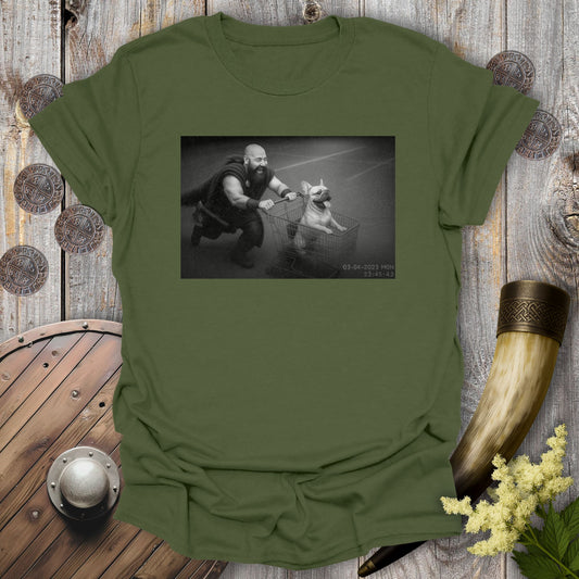 Military Green t-shirt with a graphic of a Viking and a Bulldog in a shopping cart, sprinting on a parking Lot.