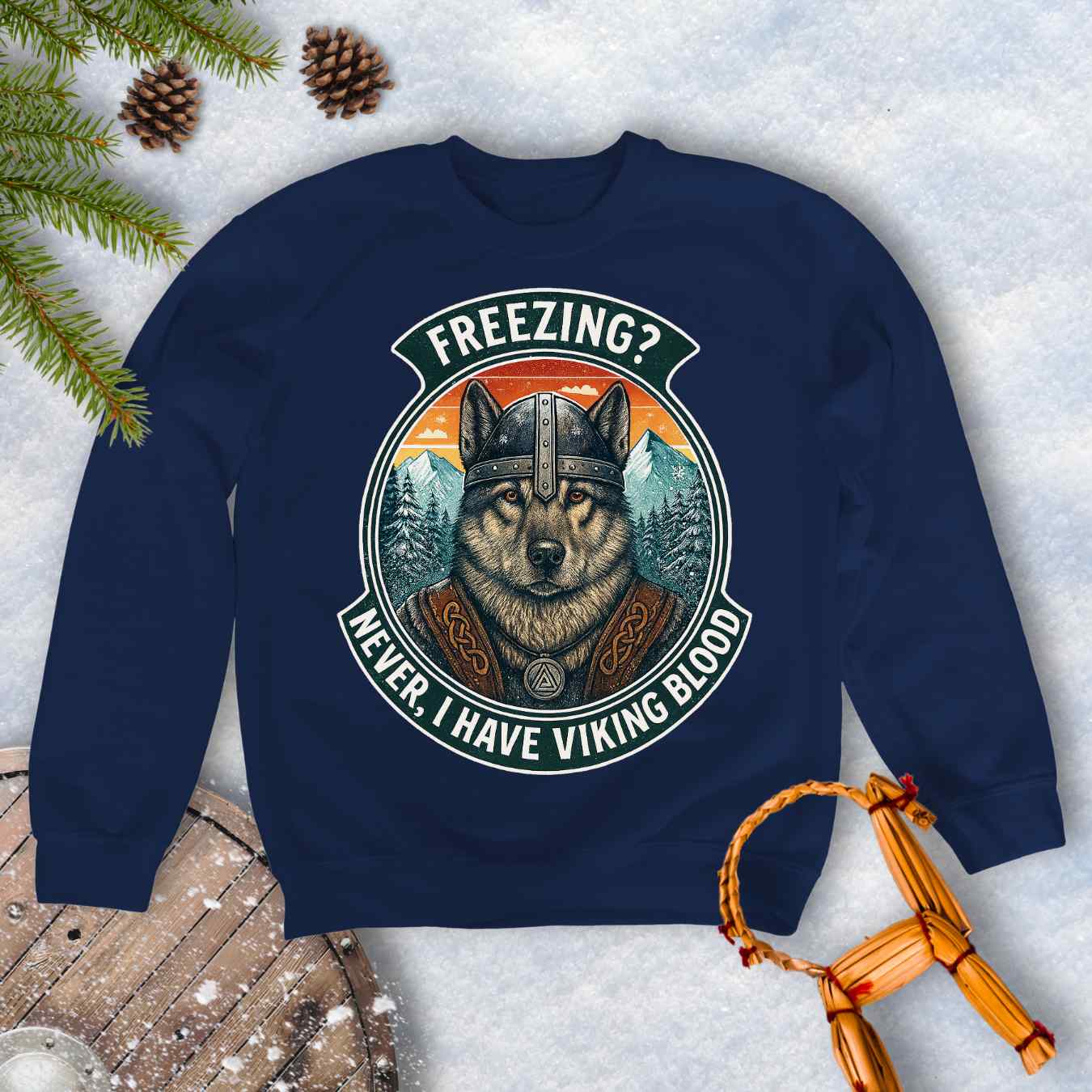 Navy Blue sweatshirt with a graphic of a Viking Norwegian Elkhound and text 'Freezing? Never, I have Viking blood' with a Nordic, retro sunset graphic in the background.