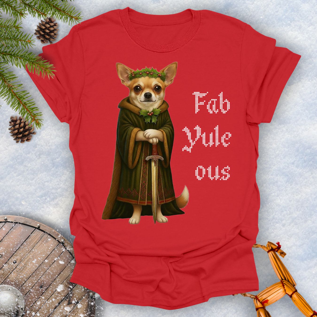 Red t-shirt with a Viking Chihuahua dog in a robe and sword graphic and 'Fab Yule ous' text, surrounded by Christmas decorations.