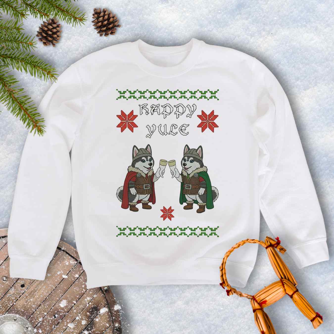 White sweatshirt Christmas sweater style and Nordic pattern with Viking Huskies Graphic. Text 'Happy Yule'.