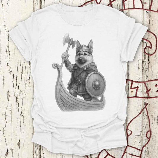 A white short-sleeve crewneck t-shirt featuring a detailed black and white graphic of a Viking dog wearing a helmet and standing in a boat with an axe and shield, displayed on a distressed white wood background with red rune markings.