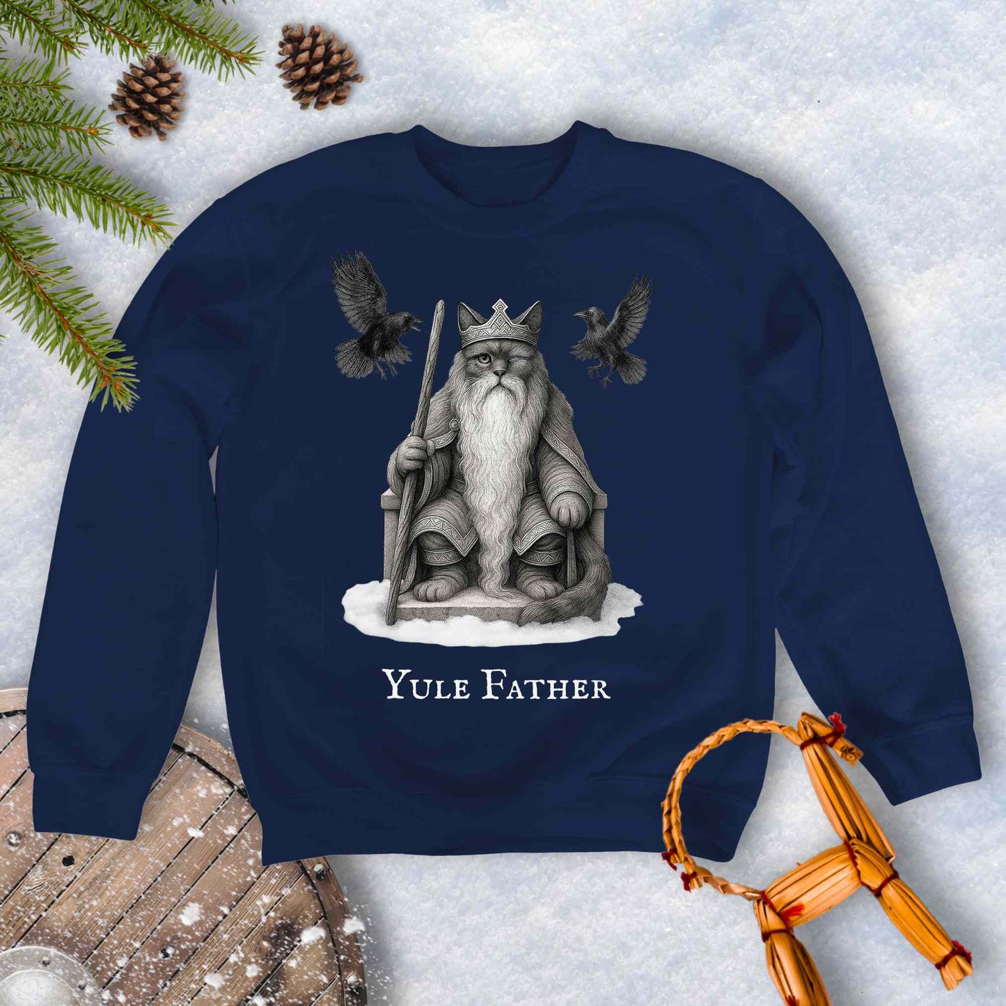 Navy blue sweatshirt with the aesir Odin reimagined as a black cat. Text 'Yule Father' design on a snowy background.