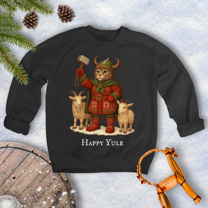 Black sweatshirt with a aesir Thor reimagined Viking cat design and two goats. 'Happy Yule' text on a snowy background.