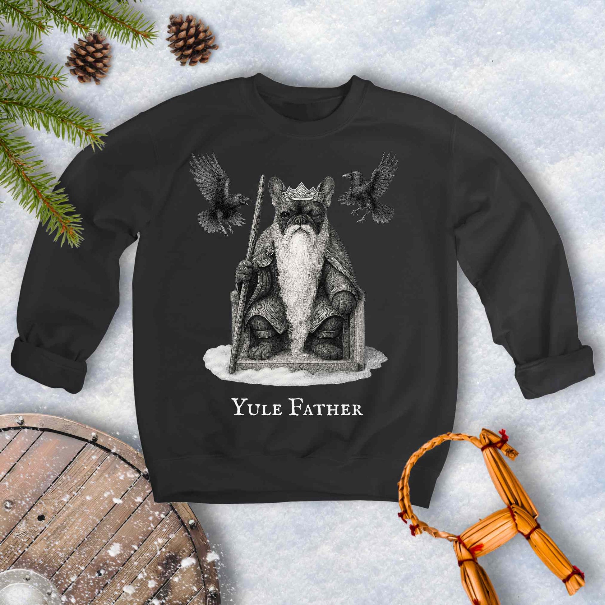 Black sweatshirt with 'Yule Father' design, Aesir Odin as a French Bulldog and ravens Huginn and Muninn, on a snowy background