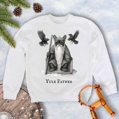 White sweatshirt with 'Yule Father' design, Aesir Odin as a French Bulldog and ravens Huginn and Muninn, on a snowy background