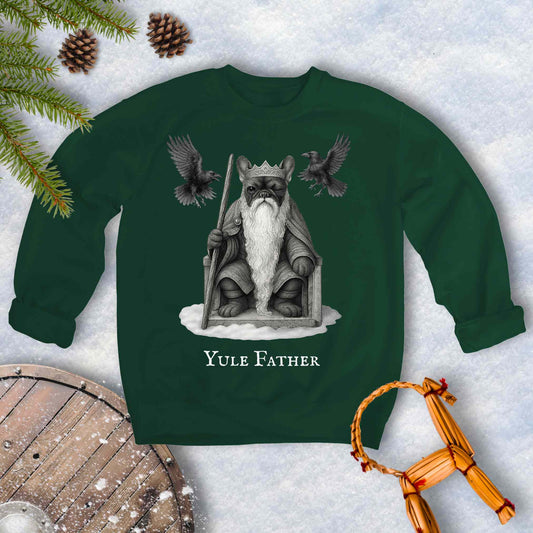 Green sweatshirt with 'Yule Father' design, Aesir Odin as a French Bulldog and ravens Huginn and Muninn, on a snowy background