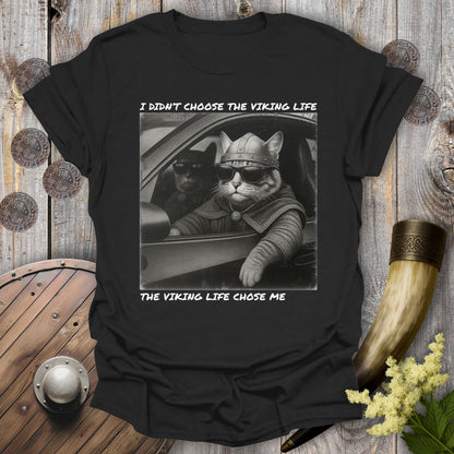 Black t-shirt with a graphic of two Viking cats sitting in a car. Text: I Didn't Choose the Viking Life, the Viking Life Chose Me".