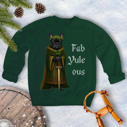 Forest Green sweatshirt with a black shieldmaiden Bulldog in a green robe and sword, surrounded by Christmas decorations and vertical text 'Fab Yule ous'.