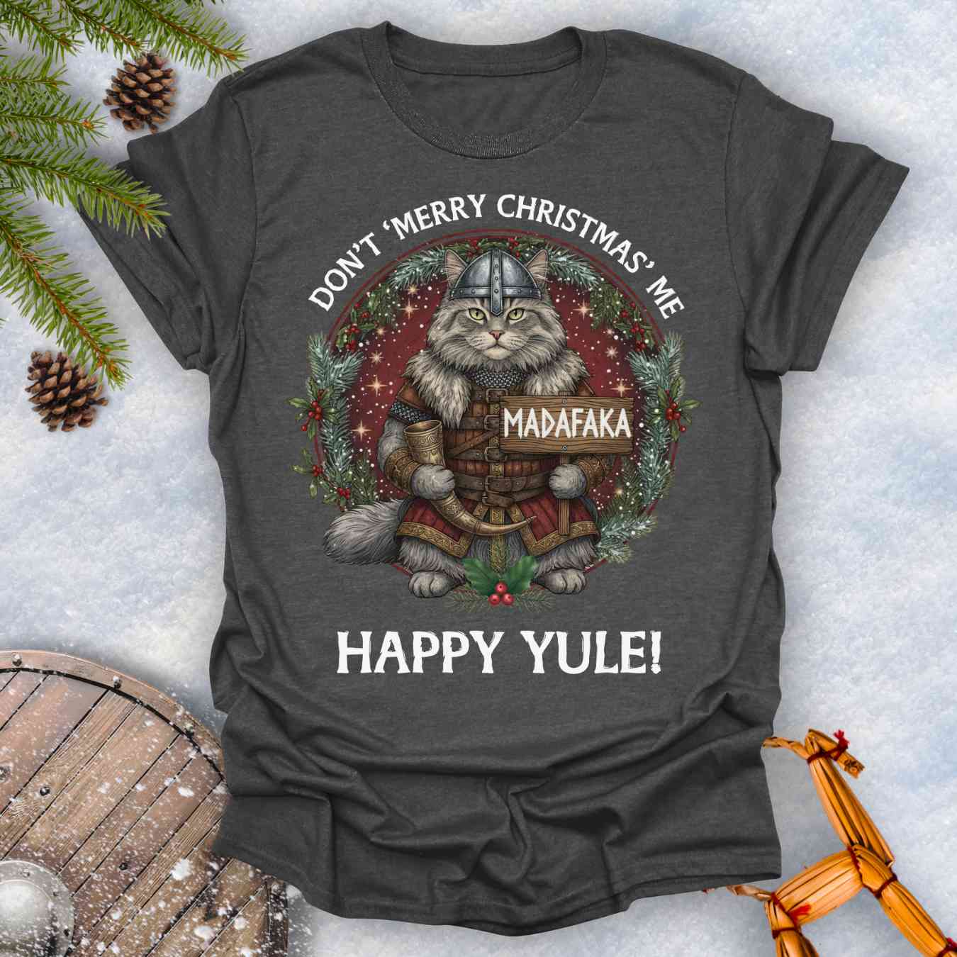 Gray t-shirt with a Viking cat Christmas graphic and Christmas-themed text Don't Merry Christmas Me Madafaka, Happy Yule.