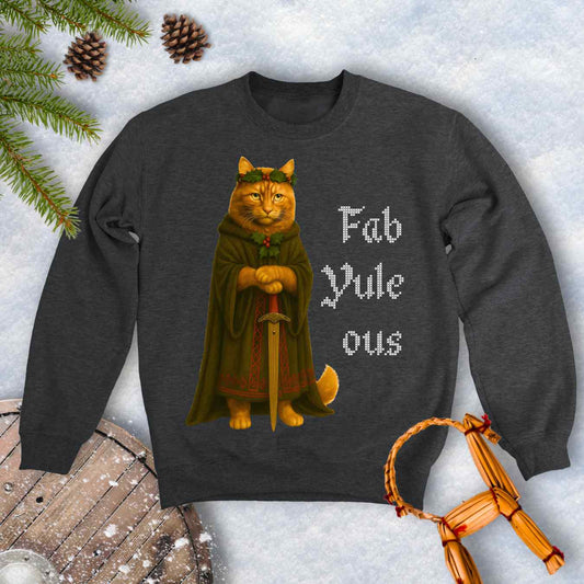 Gray dark heather sweatshirt with a Shieldmaiden cat in a cloak and sword graphic and 'Fab Yule ous' cross stich lookalike text.