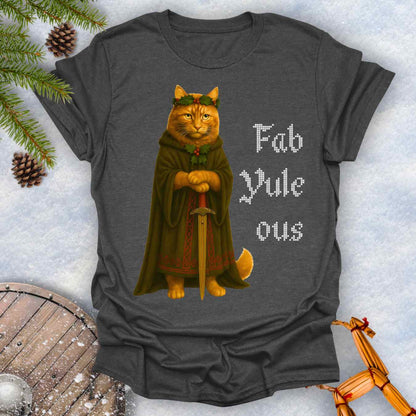 Gray dark heater colored t-shirt with a Shieldmaiden cat in a cloak and sword graphic and 'Fab Yule ous' cross stich lookalike text.