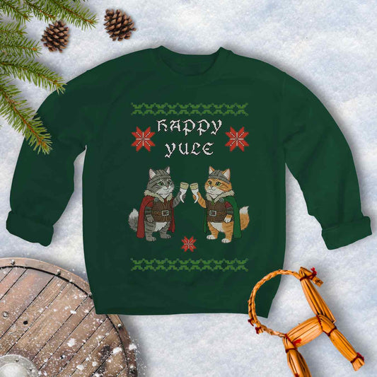 Green Ugly sweater type sweatshirt with Viking cat design and 'Happy Yule' text on a snowy background.