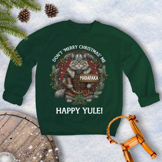 Green sweatshirt with a Viking cat Christmas graphic and Christmas-themed text Don't Merry Christmas Me Madafaka, Happy Yule.