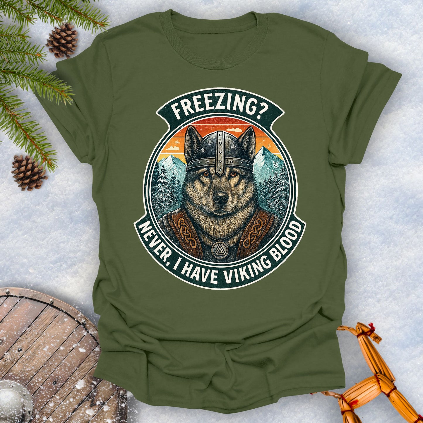 Navy Blue t-shirt with a graphic of a Viking Norwegian Elkhound and text 'Freezing? Never, I have Viking blood' with a Nordic, retro sunset graphic in the background.