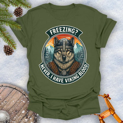 Navy Blue t-shirt with a graphic of a Viking Norwegian Elkhound and text 'Freezing? Never, I have Viking blood' with a Nordic, retro sunset graphic in the background.
