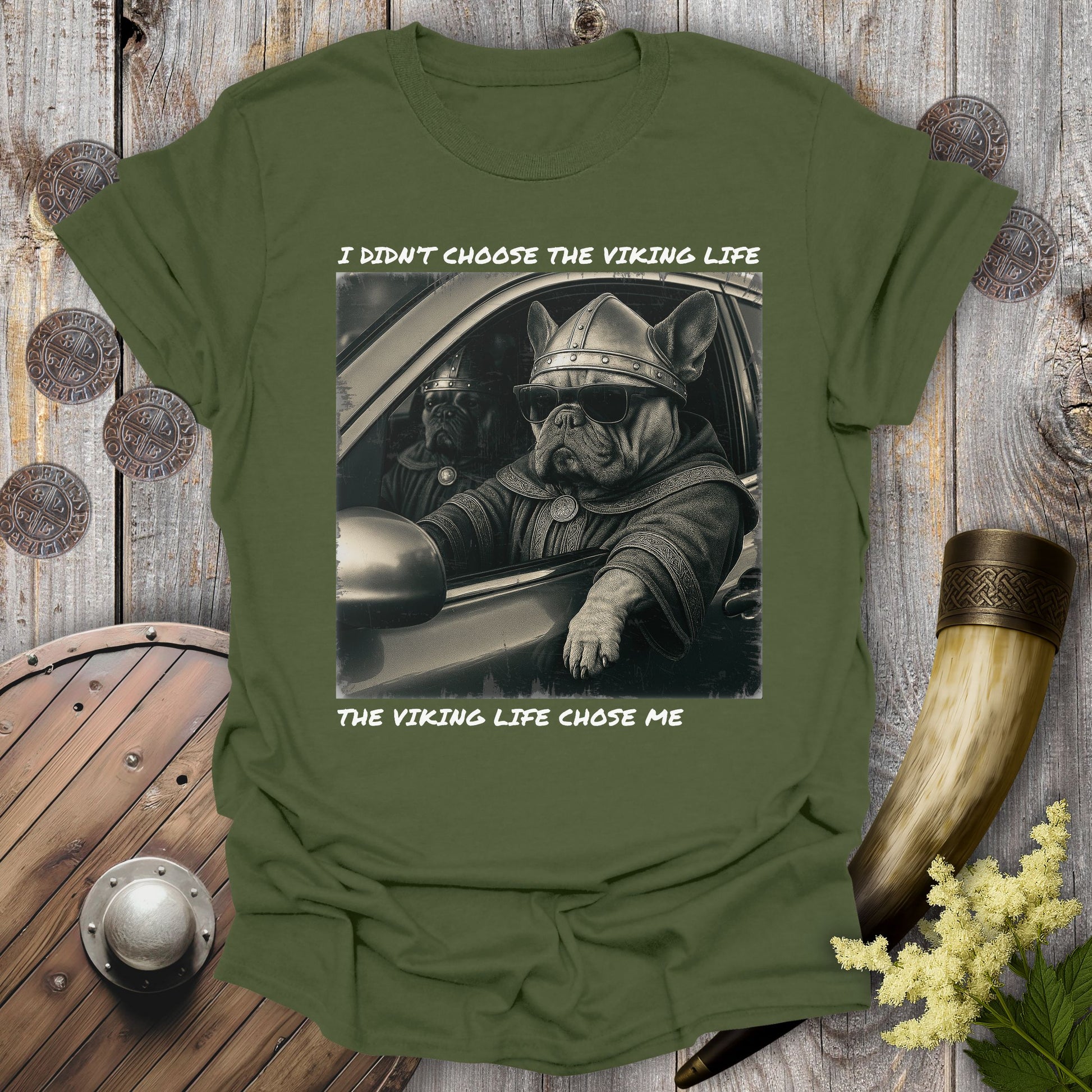 Green t-shirt with a graphic of two Viking Bulldogs sitting in a car. Text: I Didn't Choose the Viking Life, the Viking Life Chose Me".