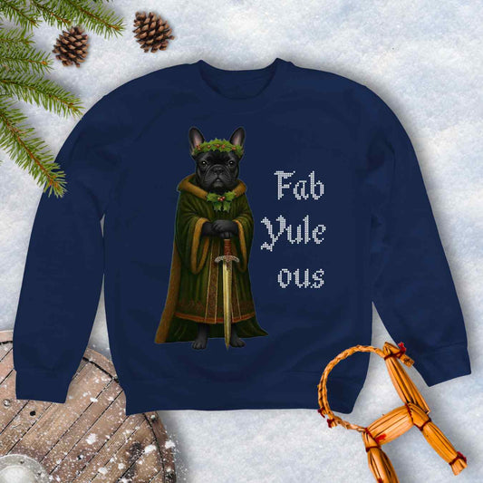 Navy blue sweatshirt with a black shieldmaiden Bulldog in a green robe and sword, surrounded by Christmas decorations and vertical text 'Fab Yule ous'.