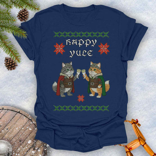 Navy Blue t-shirt with Holiday festive design, ugly sweater pattern style, of two Viking cats holding drinking horns and 'Happy Yule' text, surrounded by Christmas decorations on a snowy background.