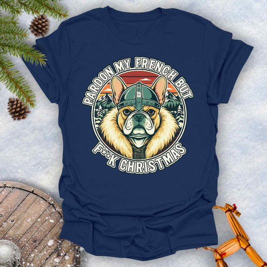 Navy Blue t-shirt with a graphic of a Viking French bulldog wearing a helmet and Norse winter retro sunset in the background. Text "Pardon My French but F**K Christmas".