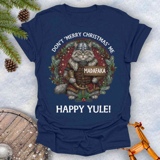 Navy blue t-shirt with a Viking cat Christmas graphic and Christmas-themed text Don't Merry Christmas Me Madafaka, Happy Yule.
