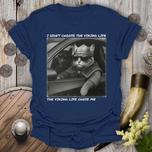 Navy Blue t-shirt with a graphic of two Viking cats sitting in a car. Text: I Didn't Choose the Viking Life, the Viking Life Chose Me".