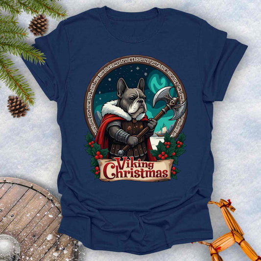 Navy blue t-shirt with a Viking-themed Christmas design featuring a Viking Bulldog, axe, and northern lights. Text: Viking Christmas.
