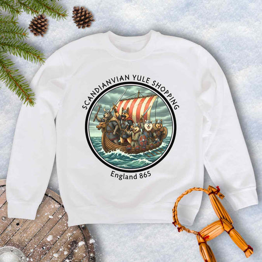White sweatshirt with Viking Dogs on a Viking ship. Text: Scandinavian Yule Shopping England 865.