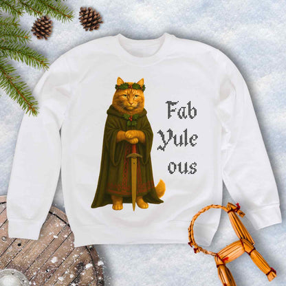 White sweatshirt with a Shieldmaiden cat in a cloak and sword graphic and 'Fab Yule ous' cross stich lookalike text.