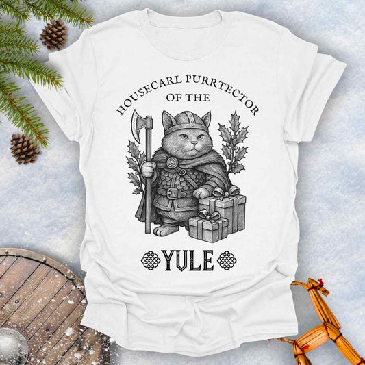 White-t-shirt with a cat in a Viking outfit and Christmas gifts with 'Housecat Purrtecher of the Yule' text. 