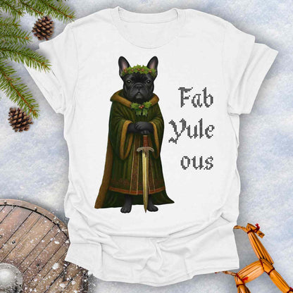 White t-shirt with a black shieldmaiden Bulldog in a green robe and sword, surrounded by Christmas decorations and vertical text 'Fab Yule ous'.