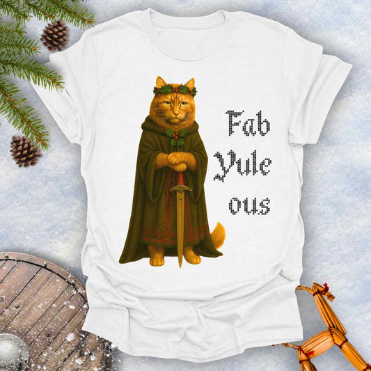 White t-shirt with a Shieldmaiden cat in a cloak and sword graphic and 'Fab Yule ous' cross stich lookalike text.