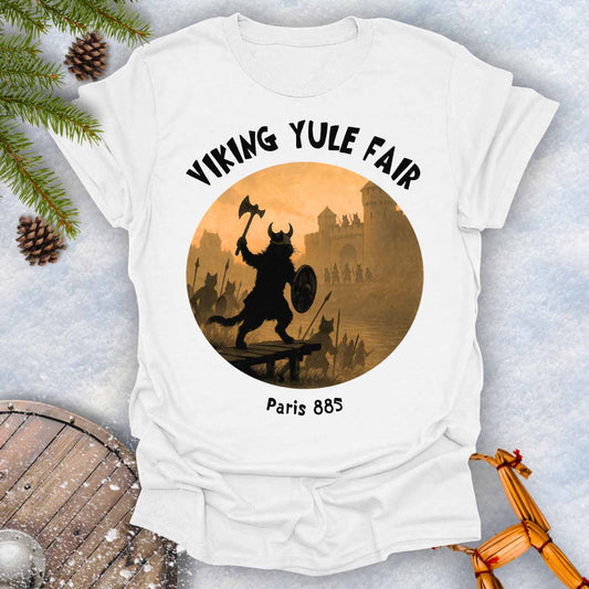 White t-shirt with Viking cat design and white 'Viking Yule Fair' and 'Paris 885' text on a snowy background.